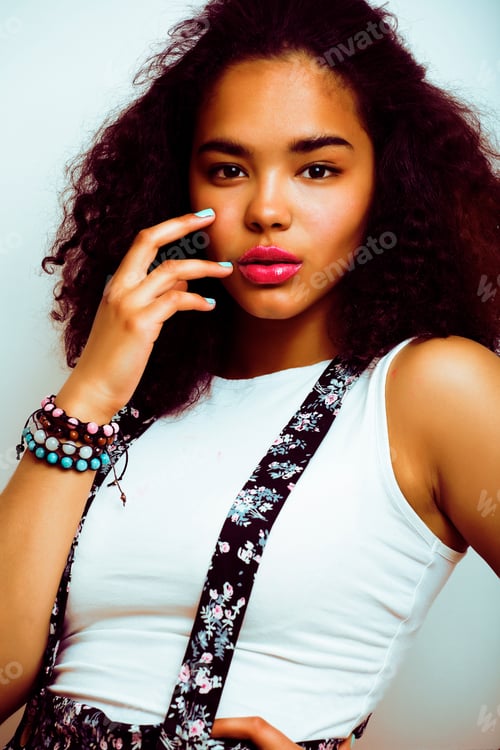 Preview: Young Pretty African American Girl Emotional Posing On White Bac