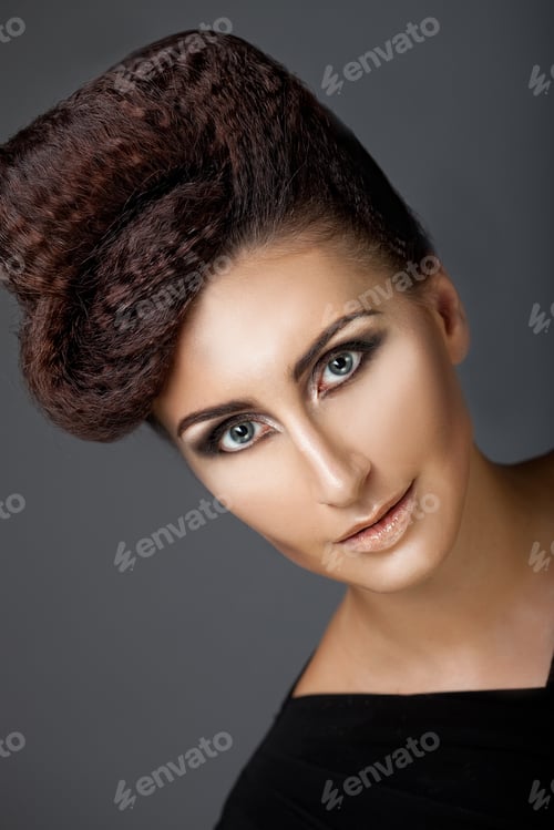 Preview: Portrait Of A Beautiful Woman With Stylish Hairstyle And Makeup