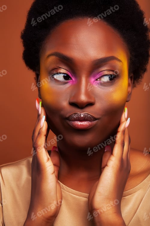 Preview: Pretty Young African American Woman With Curly Hair Posing Cheerful Gesturing On Brown Background