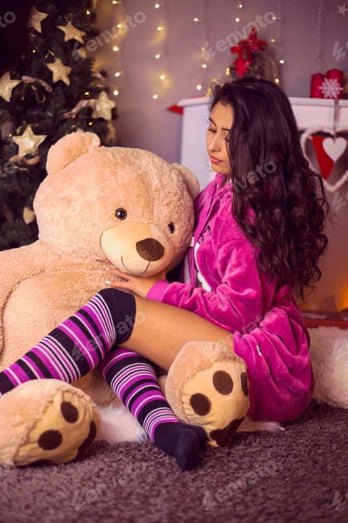 Preview: Cute Girl Posing With Teddy Bear