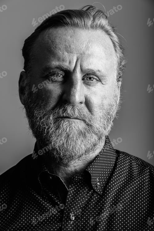 Preview: Face Of Mature Bearded Man In Gray Background