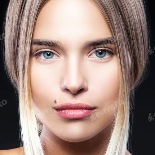 Preview: Close-Up Beauty Face Of Model Girl. Pretty Young Woman With Beauty Spot Near Mouth, Clean Skin