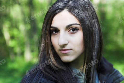 Preview: Young Woman In Summer Park