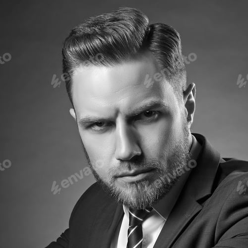 Preview: Young Handsome Bearded Caucasian Man With Blue Eyes Sitting On Chair. Perfect Skin And Hairstyle