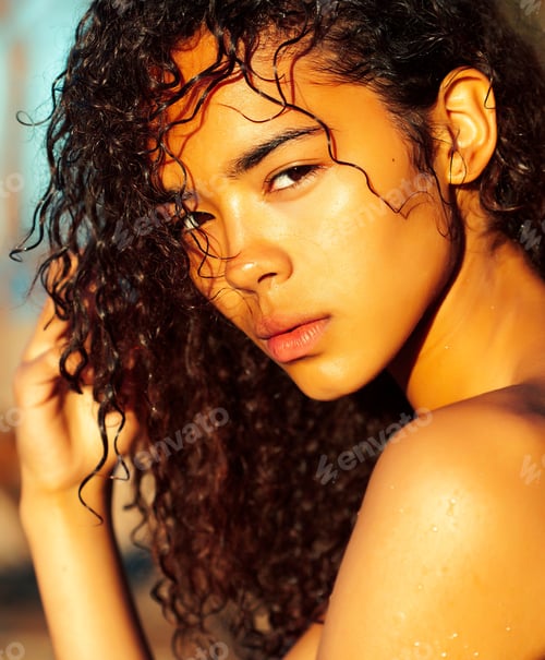 Preview: Young Pretty African Curly Girl On Sunset On Beach Looking, Lifestyle People Concept