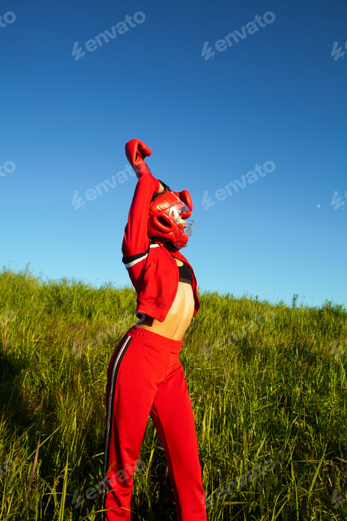 Preview: Pretty Swag Indian Girl Training Box Outside In Green Field. Lifestyle Sporty People Concept