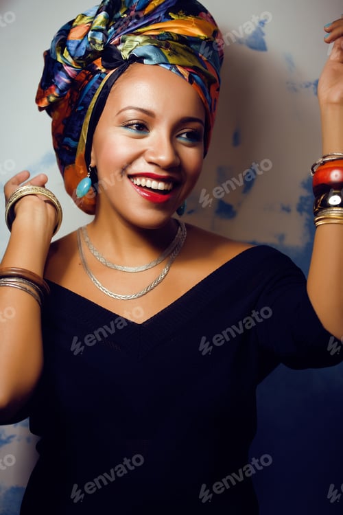 Preview: Beauty Bright African Woman With Creative Make Up, Shawl On Head Like Cubian Closeup Smiling