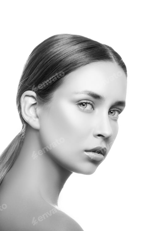 Preview: Beautiful Young Caucasian Girl With Natural Makeup Looking At Camera. Woman Portrait. Black And