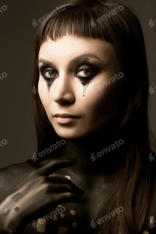 Preview: Artistic Paint On The Body Of A Young Charming Slender Girl