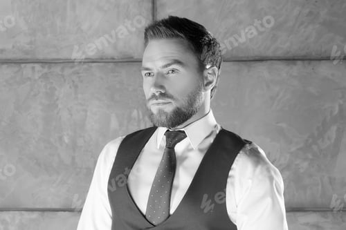 Preview: Portrait Of Handsome Stylish Bearded Young Man In Elegant Blue Suit With Vest And Perfect Hair