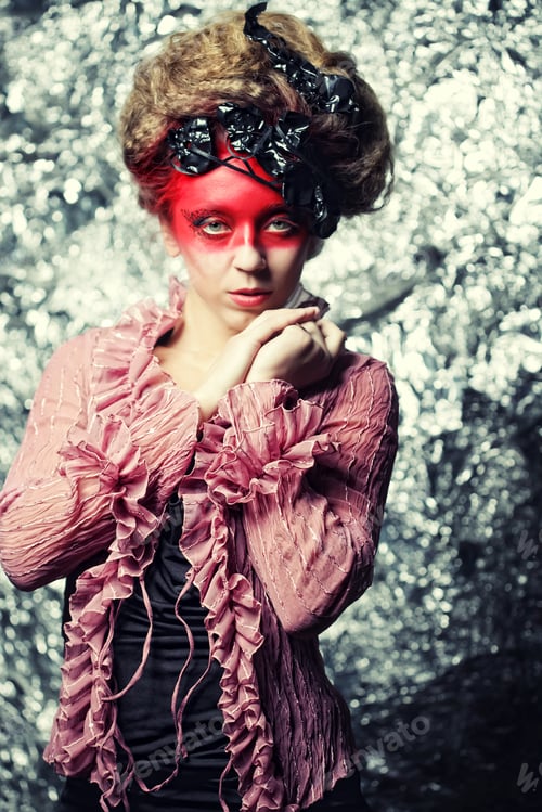 Preview: Young Woman With Creative Make-Up Over Silver Background