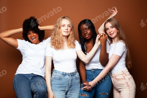Preview: Young Pretty Caucasian, Afro, Scandinavian Woman Posing Cheerful Together On Brown Background