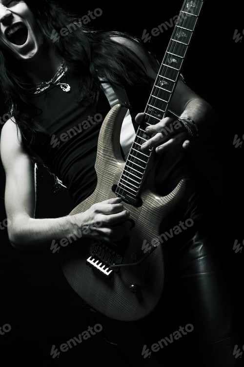 Preview: Man With Long Hair Playing Electrical Guitar.Black And White.