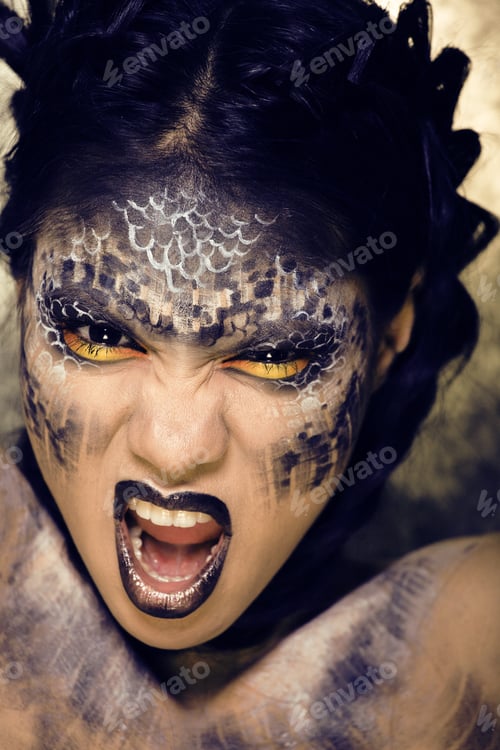 Preview: Fashion Portrait Of Pretty Young Woman With Creative Make Up Like A Snake