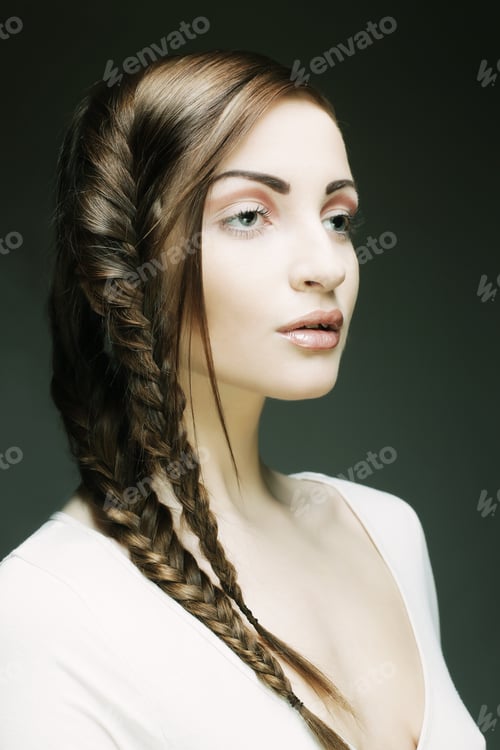 Preview: Close Up Portrait Of Beautiful Young Blonde Woman With Creative Braids Hairdo
