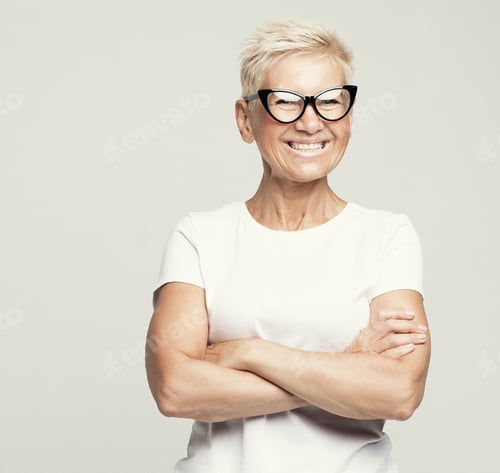 Preview: Aged People, Lifestyle And Maturity Concept: Blonde Fifty Year Old European Female With Stylish