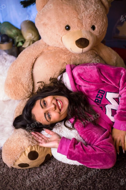 Preview: Cute Girl Posing With Teddy Bear