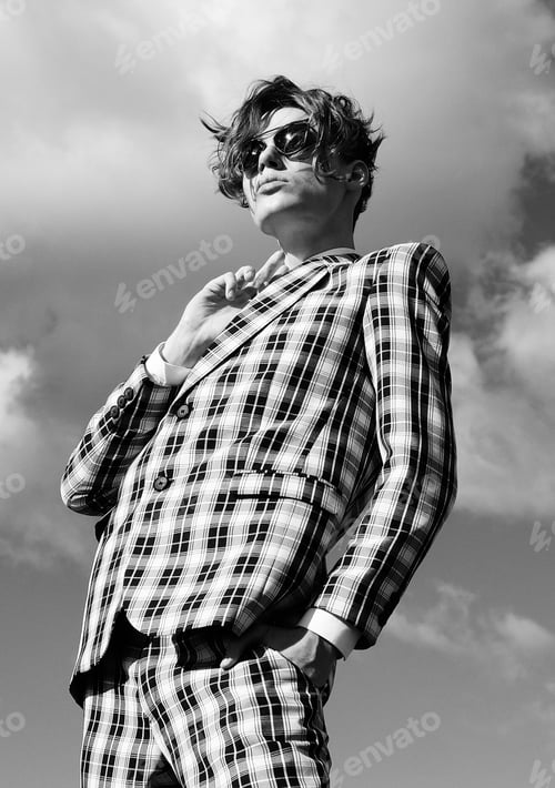 Preview: Elegant Young Handsome Man. Outdoors Fashion Portrait. Man With Glasses