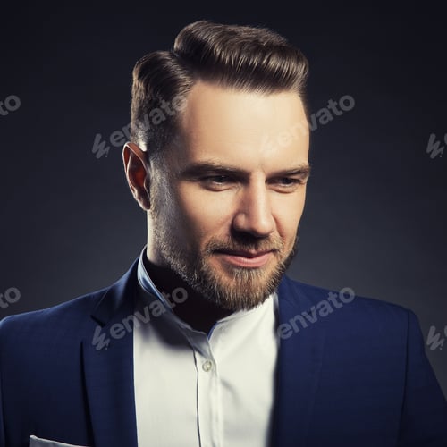 Preview: Portrait Of Handsome Stylish Caucasian Young Man In Elegant Blue Suit With Perfect Hair Style. Toned