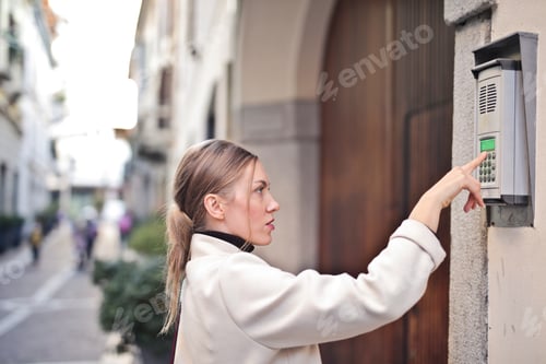 Preview: Young Woman Rings A Door Bell