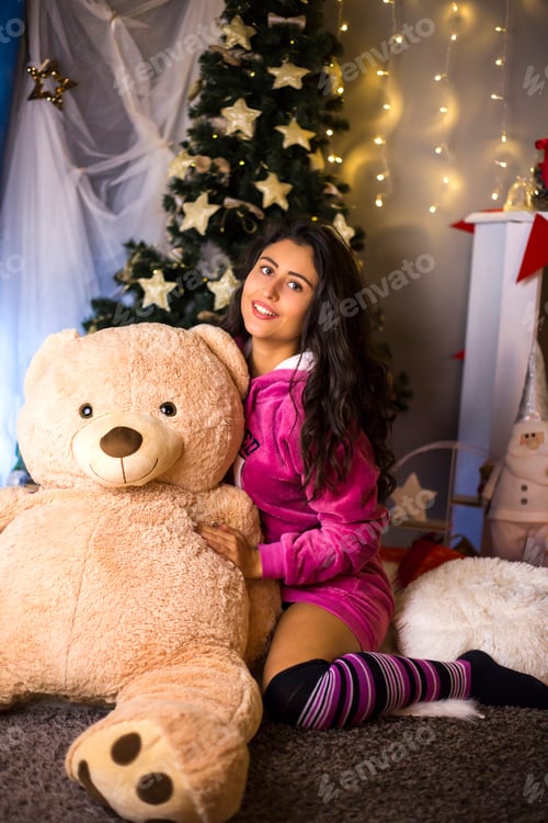 Preview: Cute Girl Posing With Teddy Bear