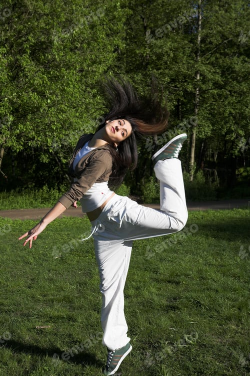 Preview: Slim Shaped Beautiful Girl Jumping In Park