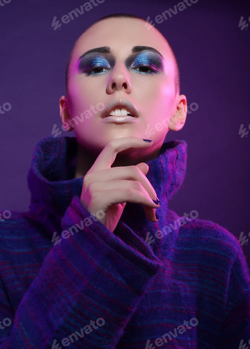 Preview: Young Fashion Model Posing In Studio. Bald. Bright Make Up.