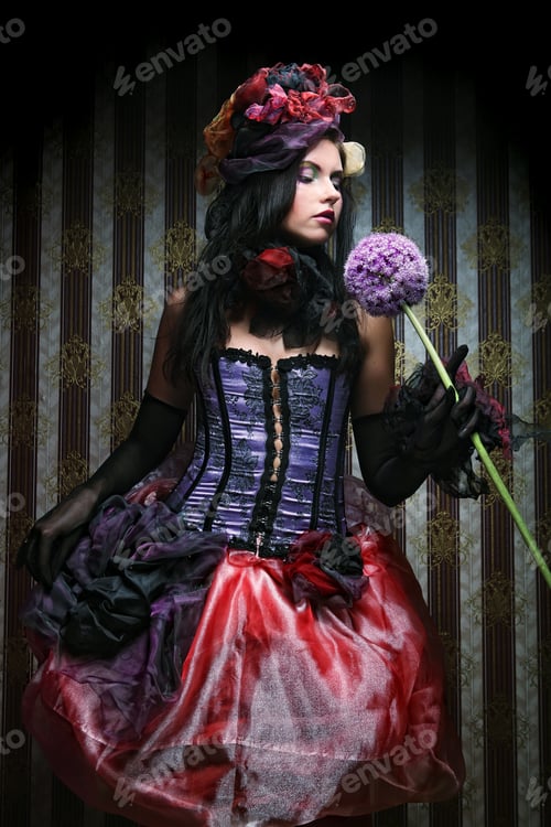Preview: Young Woman With Creative Make-Up In Doll Style With Flower
