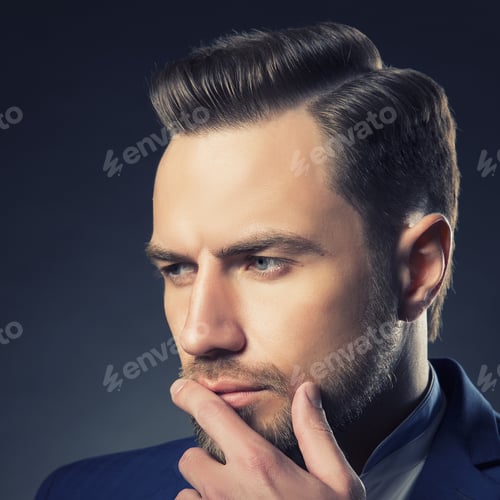 Preview: Young Handsome Thoughtful Bearded Caucasian Man With Blue Eyes And A Hand Near Chin. Perfect Skin
