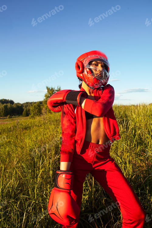 Preview: Pretty Swag Indian Girl Training Box Outside In Green Field. Lifestyle Sporty People Concept