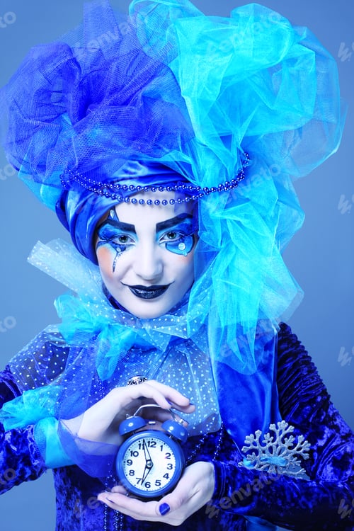 Preview: Beautiful Lady With Artistic Make-Up Holding Watch.