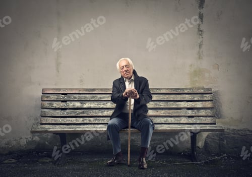 Preview: Elderly Man Sleeps Sitting On A Bench