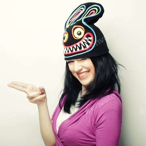 Preview: Playful Young Woman In Funny Hat With Rabbit, Studio Shot