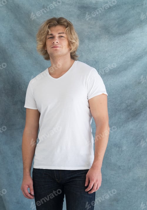 Preview: Handsome Young Man In Blank White Shirt Posing In Studio, Fashion Concept