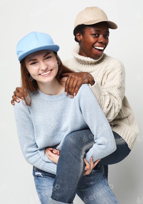 Preview: Multiethnic Friendship Concept. Cheerful European And African Women.