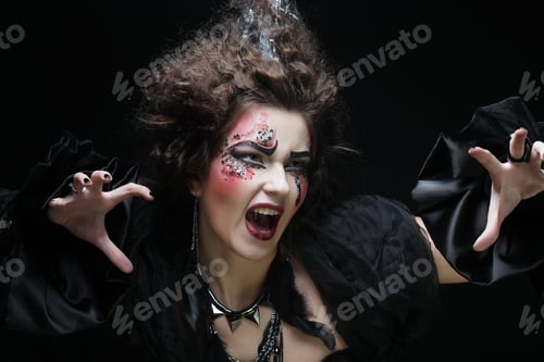 Preview: Young Woman With Creative Make Up. Halloween Theme.