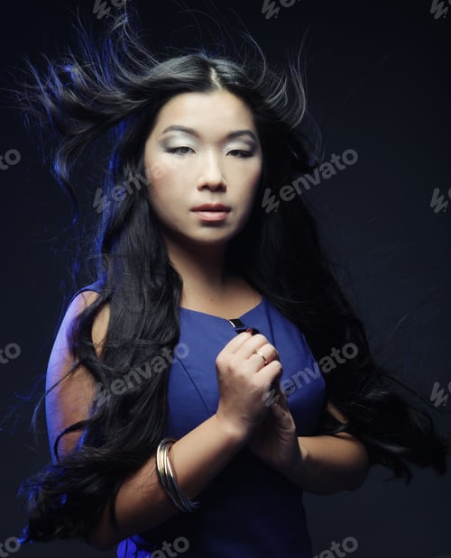 Preview: Asian Fashion Woman With Wind In The Hair