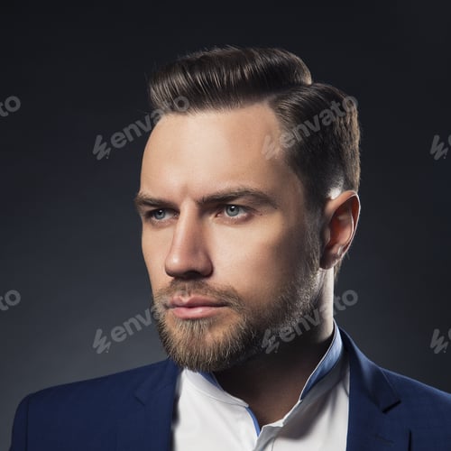 Preview: Portrait Of Handsome Stylish Caucasian Young Man In Elegant Blue Suit With Perfect Hair Style. Toned