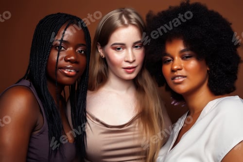 Preview: Young Pretty Caucasian, Afro, Scandinavian Woman Posing Cheerful Together On Brown Background