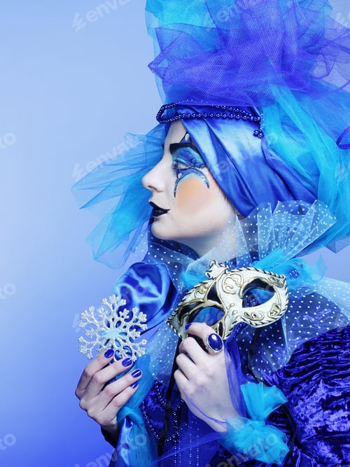 Preview: Portrait Of Young Woman With Mask In Creative Theatrical Image.