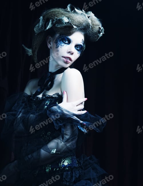 Preview: Young Woman With Creative Make Up. Halloween Theme.