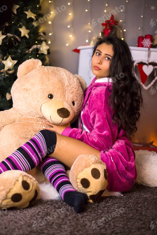 Preview: Cute Girl Posing With Teddy Bear