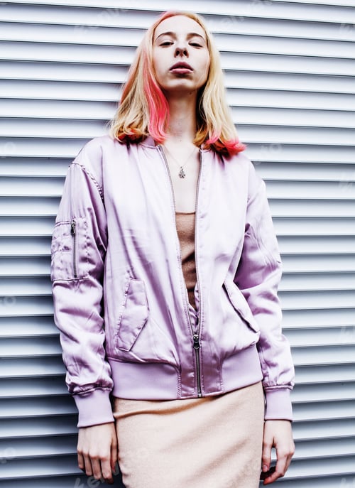 Preview: Stylish Woman in Lavender Bomber Jacket Posing