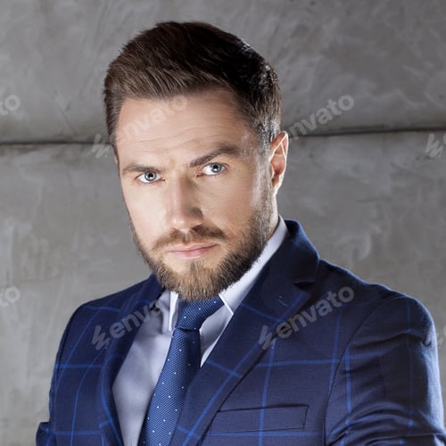 Preview: Portrait Of Handsome Stylish Bearded Young Man In Elegant Blue Suit With Vest And Tie, Perfect Hair