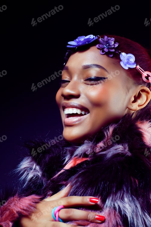 Preview: Young Pretty African American Woman In Spotted Fur Coat And Flow