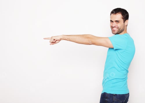Preview: Life Style And People Concept: Young Smiling Happy Man Shows Something On White Background.