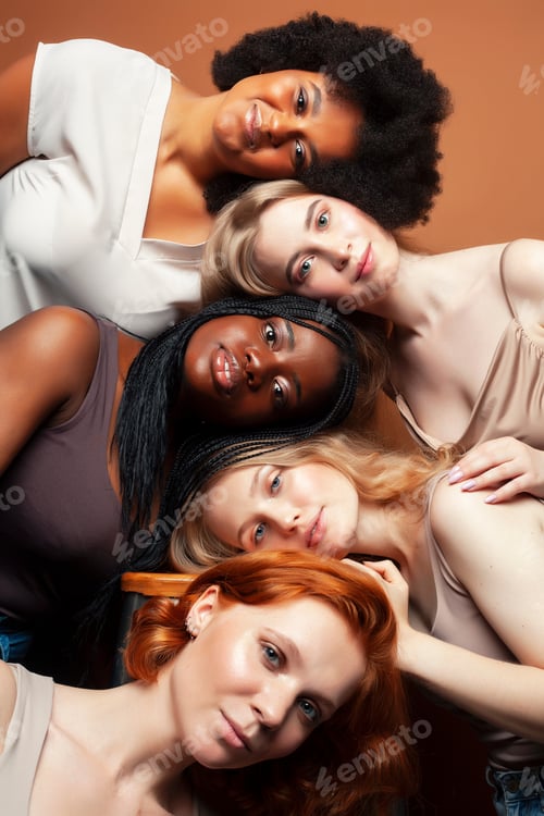 Preview: Young Pretty African And Caucasian Women Posing Cheerful Together On Brown Background, Lifestyle