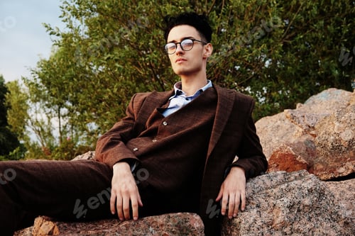 Preview: Elegant Young Handsome Man. Outdoors Fashion Portrait. Man With Glasses.