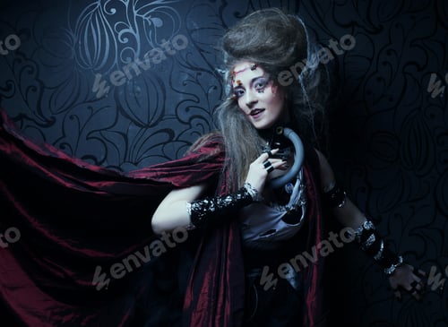 Preview: Young Woman With Creative Make Up In A Red Raincoat