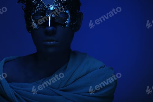 Preview: Art Photo Of A Beautiful Woman With Blue Face With Mask